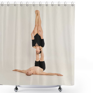 Personality  A Shirtless Young Man And A Woman Performing Acrobatic Element In Perfect Synchronicity Against A White Background. Shower Curtains