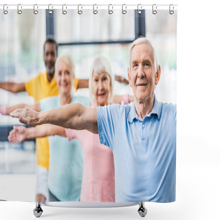 Personality  Selective Focus Of Multicultural Senior Athletes Synchronous Doing Exercise At Gym Shower Curtains