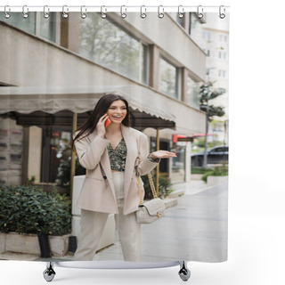 Personality  Happy Young Woman With Brunette Long Hair And Makeup Smiling While Talking On Smartphone And Standing In Trendy Outfit With Handbag On Chain Strap Near Blurred Fancy Restaurant In Istanbul  Shower Curtains