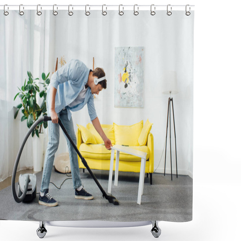 Personality  Side View Of Man In Headphones Cleaning Carpet With Vacuum Cleaner Near Coffee Table At Home Shower Curtains