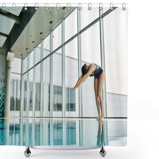 Personality  A Young Woman In A Black Bathing Suit Stands Gracefully In Front Of An Indoor Swimming Pool. Shower Curtains
