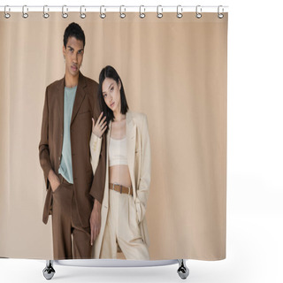 Personality  Young Multiethnic Couple In Trendy Pantsuits Posing With Hands In Pockets Isolated On Beige Shower Curtains