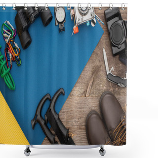 Personality  Top View Of Hiking Equipment On Blue Sleeping Mat, Photo Camera And Boots On Wooden Table Shower Curtains