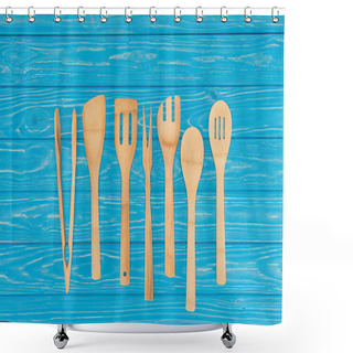 Personality  Top View Of Wooden Kitchen Utensils Placed In Row On Blue Table  Shower Curtains