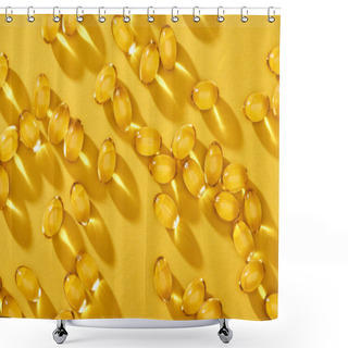 Personality  Top View Of Golden Shiny Fish Oil Capsules Scattered On Yellow Bright Background Shower Curtains