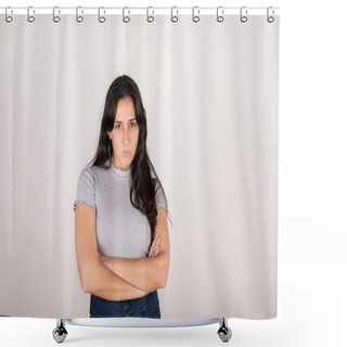 Personality  Portrait Of A Young Latin Woman Dressed In A Grey T-shirt With Her Arms Crossed And An Angry Face, Looking At The Camera, On A White Background Shower Curtains