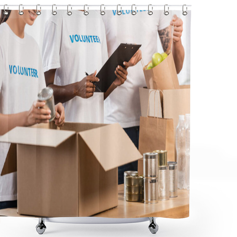 Personality  Cropped View Of Multicultural Volunteers With Clipboard Packing Food On Table In Charity Center Shower Curtains