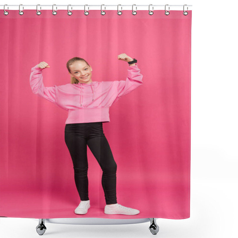 Personality  strong athletic kid showing muscles and biceps, isolated on pink shower curtains