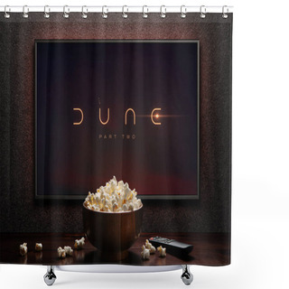 Personality  TV Screen Playing Dune Part Two Trailer Or Movie. TV With Remote Control And Popcorn Bowl. Astana, Kazakhstan - May 15, 2023. Shower Curtains