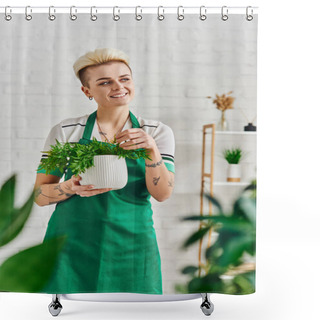 Personality  Dreamy And Happy Tattooed Woman In Green Apron Looking Away While Standing With Potted Houseplant In Modern Living Room, Blurred Foreground, Sustainable Home Decor And Green Living Concept Shower Curtains