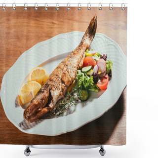 Personality  Fried Fish Laying On White Plate With Orange Slices And Sauce Over Wooden Surface    Shower Curtains