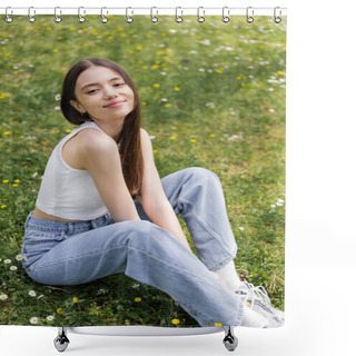Personality  Overjoyed Woman In Top And Jeans Looking At Camera While Sitting On Lawn With Flowers In Park  Shower Curtains