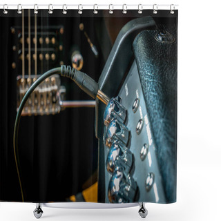 Personality  Amplifier With Jack Plugged In And A Black Guitar In The Background. Shower Curtains