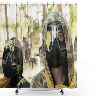 Personality  Summer. Paintball. Two Players With A Defeat In The Head In A Camouflage Suit And A Protective Mask With A Yellow Blot On The Glass. Sports Lifestyle, Entertainment, Hobbies And Team War Games. Shower Curtains