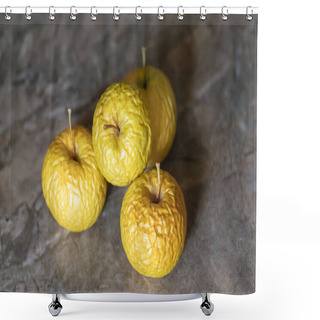 Personality  Wrinkled Yellow Old Apples Lies On The Table Top, Closeup On Neutral Background. Shower Curtains