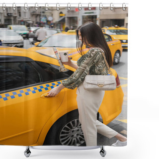 Personality  Chic Woman With Long Hair Holding Paper Cup With Coffee And Newspaper While Standing In Trendy Outfit With Handbag On Chain Strap Near Yellow Taxi On Blurred Urban Street In Istanbul  Shower Curtains