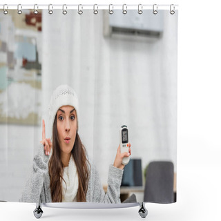 Personality  Freezed Young Woman In Warm Clothes Having Idea While Holding Air Conditioner Remote Control At Home Shower Curtains