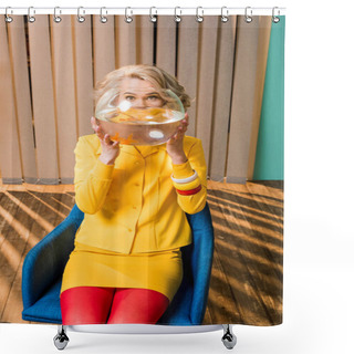 Personality  Portrait Of Woman In Retro Clothing With Golden Fish In Aquarium Sitting On Chair At Colorful Apartment, Doll House Concept Shower Curtains
