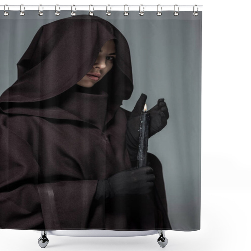 Personality  woman in death costume holding burning candle isolated on grey shower curtains