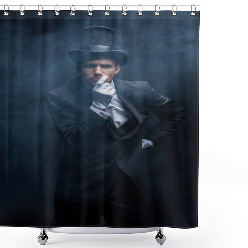 Personality  thoughtful magician in suit and hat standing in dark smoky room shower curtains