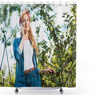 Personality  Low Angle View Of Smiling Attractive Farmer Talking By Smartphone In Apple Garden At Farm Shower Curtains