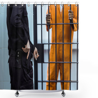 Personality  Cropped Image Of Prison Guard Putting Hand On Gun Near Prison Bars Shower Curtains