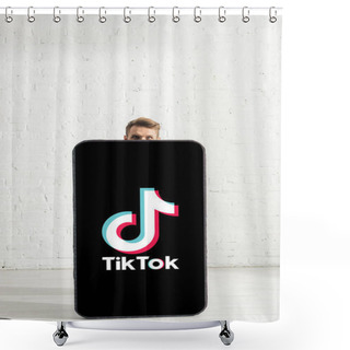 Personality  KYIV, UKRAINE - FEBRUARY 21, 2020: Man Looking At Camera Near Big Model Of Smartphone With TikTok App  Shower Curtains