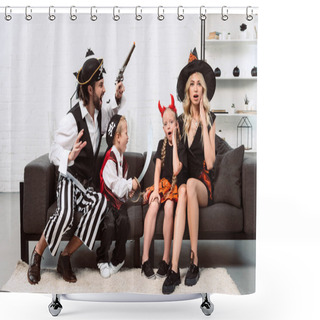 Personality  Father And Son In Pirates Costumes Scaring Mother And Daughter On Sofa At Home Shower Curtains