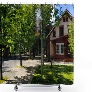 Personality  Urban Scene With Green Trees On Street And Buildings In Riga, Latvia Shower Curtains
