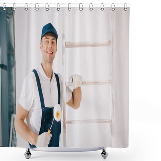 Personality  Handsome Young Painter In Uniform Smiling At Camera While Standing Near Ladder And Holding Paint Roller Shower Curtains