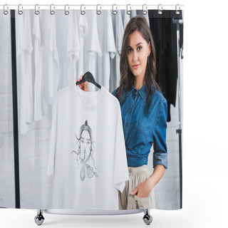 Personality  Young Female Fashion Designer Showing White T-shirt With Print In Clothing Design Studio Shower Curtains