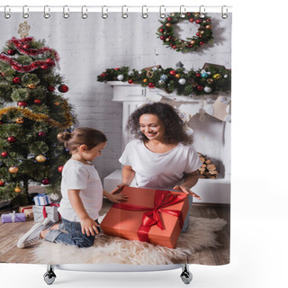 Personality  Mother With Daughter Touching Big Gift Box Near Fireplace And Pine At Home Shower Curtains