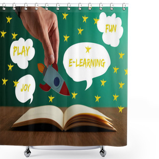 Personality  Cropped View Of Teacher Holding Rocket Over Open Book With Play, Joy, Fun And E-learning Words Shower Curtains