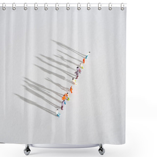 Personality  Top View Of Row Of Plastic People Figures With Shadow On White Surface Shower Curtains