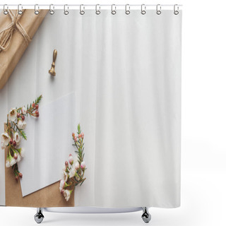 Personality  Top View Of Empty Blank With Brown Envelope, Flowers, Stamp And Wrapped Gift On Grey Background Shower Curtains