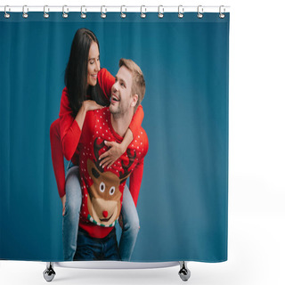 Personality  Cheerful Couple In Christmas Sweaters Piggybacking Isolated On Blue Shower Curtains