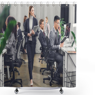Personality  Beautiful Young Businesswoman Holding Folder With Papers And Looking At Colleagues While Walking In Office  Shower Curtains