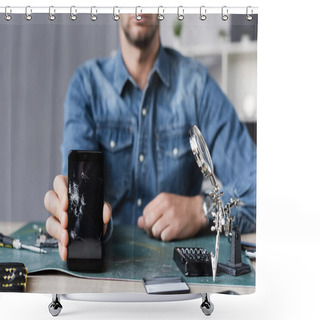 Personality  Cropped View Of Repairman Showing Smashed Smartphone While Sitting At Table With Magnifier On Blurred Background Shower Curtains