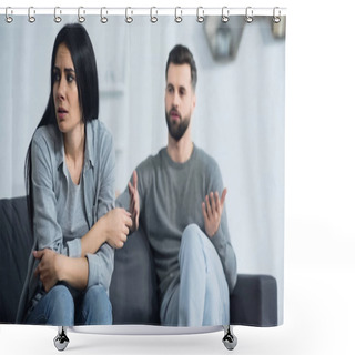 Personality  Frustrated Woman Sitting Near Blurred And Displeased Boyfriend Quarrelling In Living Room Shower Curtains