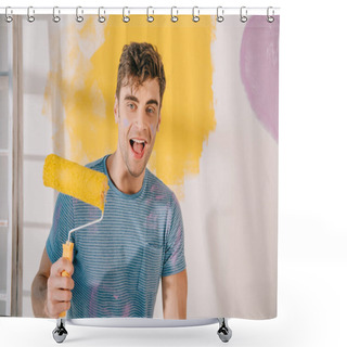 Personality  Cheerful Young Man Holding Yellow Paint Roller While Looking At Camera Shower Curtains