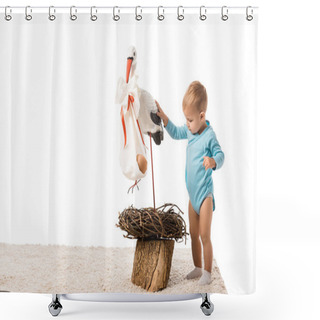 Personality  Cute Toddler Boy In Blue Bodysuit Standing On Carpet And Touching Decorative Stork Isolated On White Shower Curtains