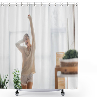 Personality  Overjoyed Woman In Knitted Sweater And Wireless Headphones Dancing While Having Fun In Modern Apartment  Shower Curtains
