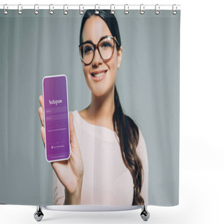 Personality  Smiling Girl Presenting Smartphone With Instagram Appliance, Isolated On Grey Shower Curtains
