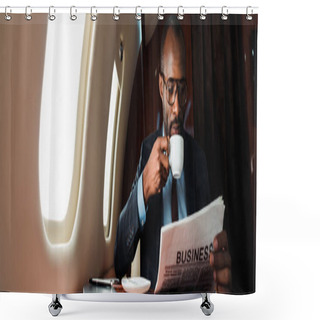 Personality  Panoramic Shot Of African American Businessman In Glasses Reading Business Newspaper While Holding Cup In Private Plane  Shower Curtains
