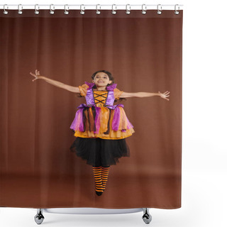 Personality  Happy Girl In Colorful Halloween Costume Looking At Camera And Jumping On Brown Background, Levitate Shower Curtains