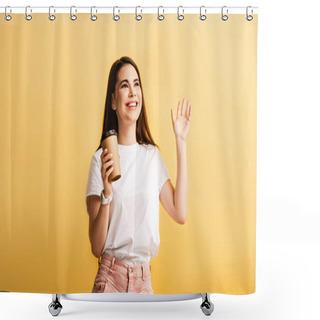 Personality  Happy Girl Holding Coffee To Go And Waving Hand While Looking Away Isolated On Yellow Shower Curtains