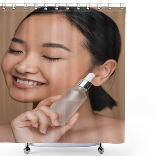 Personality  Close Up View Of Smiling Asian Model With Closed Eyes Holding Serum Isolated On Brown  Shower Curtains