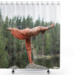 Personality  Side View Of Shirtless Buddhist Meditating In Half Moon Pose On Rocks Over River Shower Curtains