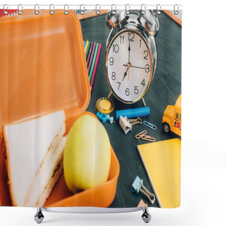 Personality  Selective Focus Of Lunch Box With Tasty Sandwiches And Ripe Apple Near Vintage Alarm Clock And School Supplies On Black Chalkboard Shower Curtains