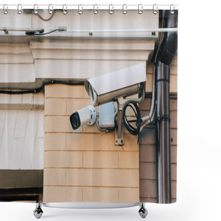 Personality  Close Up View Of Security Cameras On Orange Colored Building Facade Shower Curtains